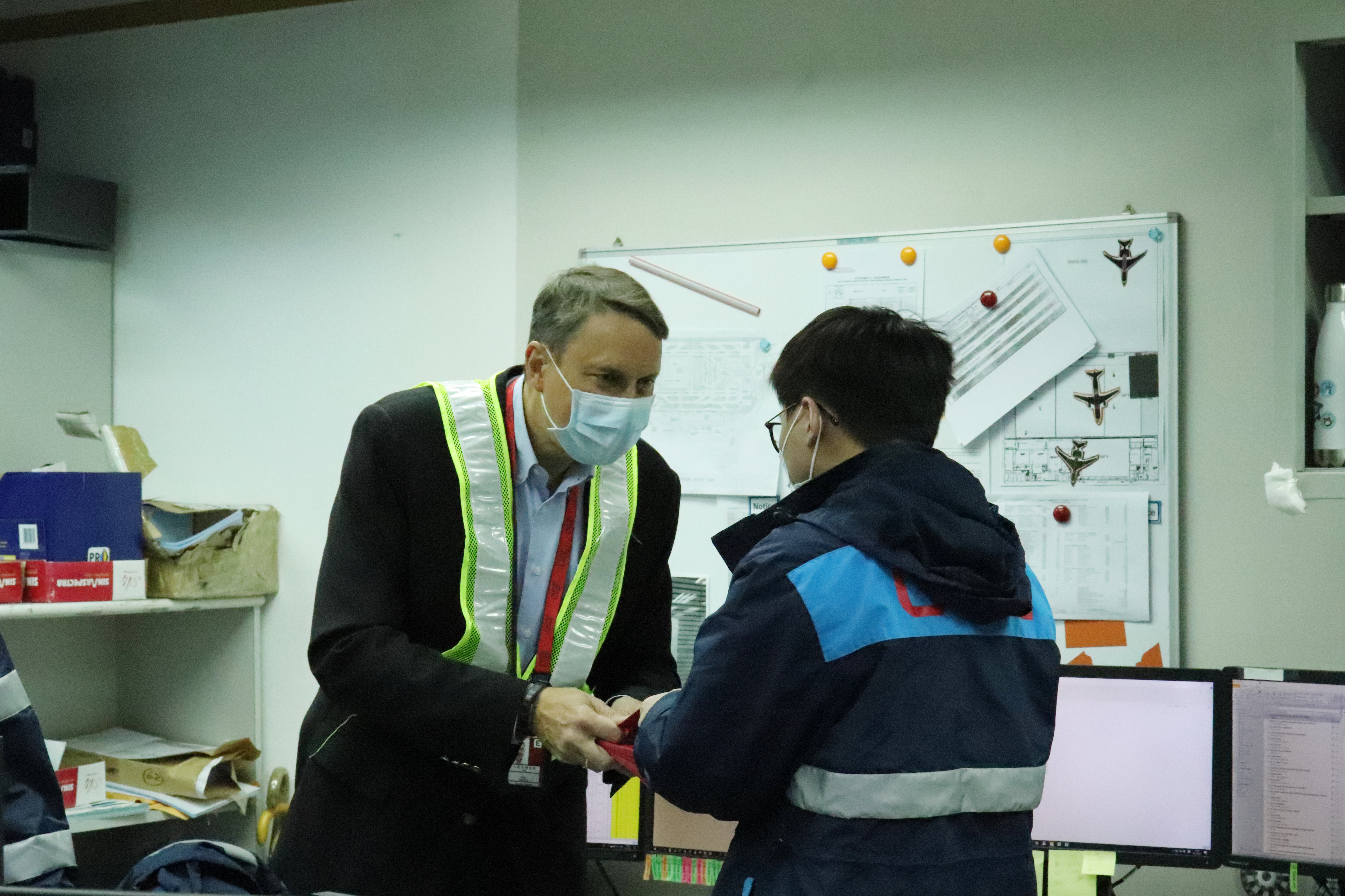 CEO hands out red packets wishing all staff good health